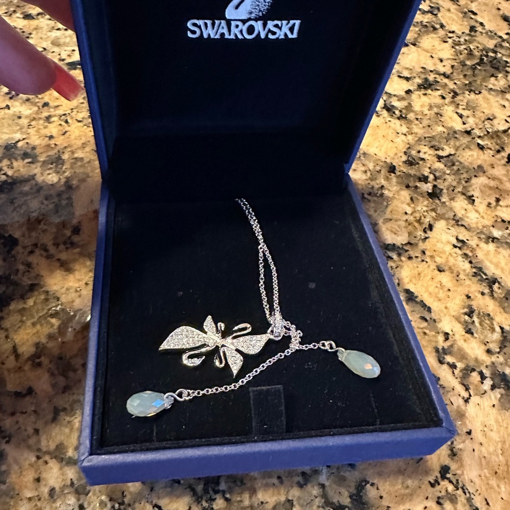 Swarovski crystal pendant. New in it’s box. Never used Original price $90